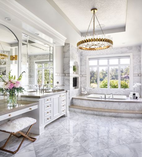 Bravura Finishes white textural glass studded ceiling. Kohler plumbing from Keller Supply. Arteriors Haskell Large Chandelier.