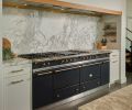 Calacatta Viola marble backsplash, natural stone slab. Lacanche Sully 2200 Classique gas range.