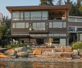 Marvin Ultimate Clad windows and Fleetwood sliding glass door from Cherry Creek Windows and Doors. Standing seam metal roof by Weatheright Roofing.