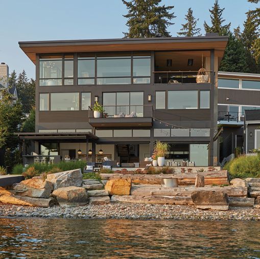 Marvin Ultimate Clad windows and Fleetwood sliding glass door from Cherry Creek Windows and Doors. Standing seam metal roof by Weatheright Roofing.