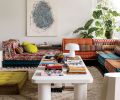 Mah Jong Sofa by Roche Bobois. Custom Waka Waka coffee table. Art by Sue Danielson.