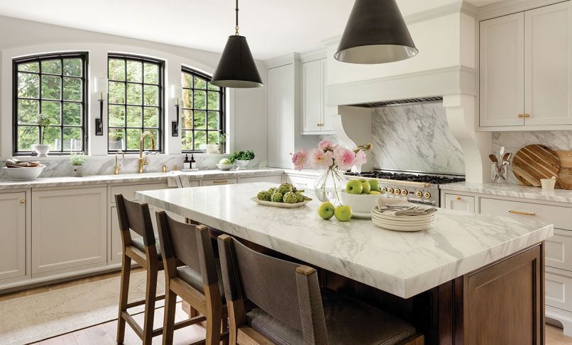 Meticulous craftsmanship and materials transform the kitchen of this 1978 home into something worthy of its heritage. Flush inset cabinets, marble countertops, and brass hardware from Schaub + Company embody an ageless style.