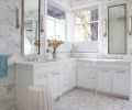 Custom designed medicine cabinets in polished nickel, by Studio AM Architects & Interiors and metal fabricator, Pepperbox. Ann Sacks flooring and walls paired with Wygal Builders cabinetry.