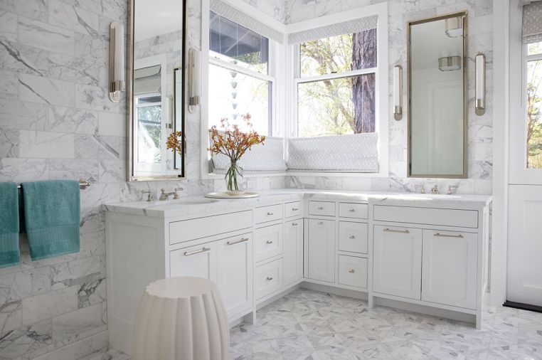 Custom designed medicine cabinets in polished nickel, by Studio AM Architects & Interiors and metal fabricator, Pepperbox. Ann Sacks flooring and walls paired with Wygal Builders cabinetry.