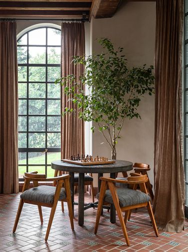 Nicky Kehoe game table pair with comfy vintage Allan Gould chairs from 1st Dibs, de le Cuona upholstery.