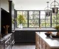 Handsome Northwest Custom Cabinetry ties to Albert Lee Appliances. Urban Electric pendants echo Steel-Arte windows by Dynamic Fenestration. Watermark plumbing and hardware from Hardware International provide the final touches.