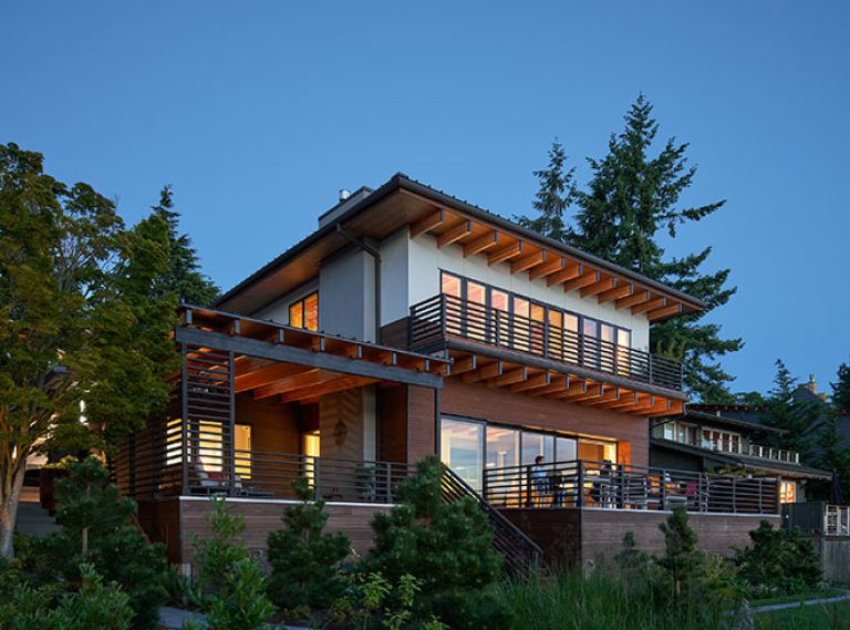 Doors, windows, posts and beams, and framing materials were all provided by Lindal Cedar Homes, as were the exterior siding materials, including Shou Sugi Ban, white fiber cement panels and lumber.