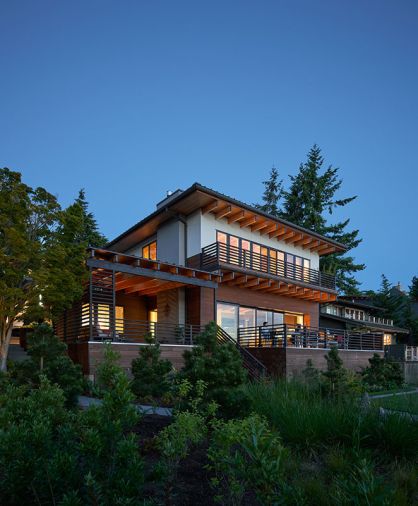 Doors, windows, posts and beams, and framing materials were all provided by Lindal Cedar Homes, as were the exterior siding materials, including Shou Sugi Ban, white fiber cement panels and lumber.