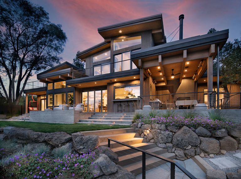 In this 3,800-square-foot custom house on the Deschutes River in Bend, Oregon, the Marvin windows and doors, and La Cantina folding door were sourced from Parr Lumber.