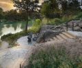 The lower patio is composed of New York blue flagstone from Mutual Materials, while the custom steel railing is from Ponderosa Forge.