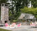 After spotting the English Hartley Botanic greenhouse a few years ago, the homeowners found the perfect spot for it on the back patio. Furniture includes powder coated aluminum swivel chairs from Sutherland Furniture and McKinnon Harris table and chairs with Thibaut fabric from the Dixon Group.