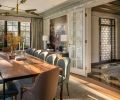 Lighting the dining room, a Tarroja Cross fixture from David Weeks Studio and Jean-Marc Frey French Antiques Murano glass table lamps. Harris chairs from Quintus.