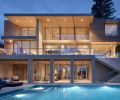 The cedar lap siding is from Ramquist Construction. Sky-Frame glass wall in Great Room features two electric doors, with the other windows from Glasbox™ Windows and Doors. Surrounding the pool, Fujiwa Tile, and elegant furnishings from Terris Draheim Outdoor.