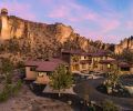 The exterior has Eagle concrete roof tiles with Tesla solar panels, Parex USA Stucco in the “Dry River” color, Cabinet Ridge Ledgestone used as accents, and aluminum-clad wood windows from Sierra Pacific. There are also Tesla wall batteries.
