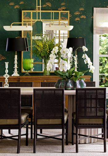 Maison, Inc. turns the homeowner’s passion for de Gournay wallcoverings into a breathtaking dining room. Here, a gold lattice mirror reflects multiple hand-painted peacocks, while a David Iastesta Weatherly Breakfront grounds the vignette. Finally, contrasting styles – modern Eos Chandelier with classic Karni bone inlay lamps – create take-your-breath-away beauty.