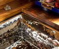 The Kallista hammered nickel bar sink from Ann Sacks adds additional glitter.