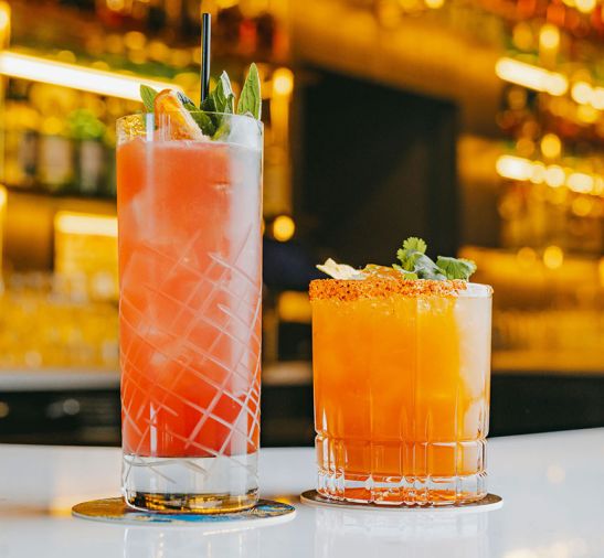 Dear Irene shakes-up the Al Pastor Mezcalita with a spicy rim as well as the Ranch Rosé cocktail with blood orange cordial.