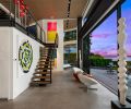 The patio has cast-in-place concrete slab pavers surrounded by smaller pavers from Mutual Materials. “Opening up those sliding doors makes it so they’re able to basically live outside while they’re inside the house,” says architect Devin Johnson of Johnson Squared Architects.
