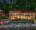 The exterior has rain screened Batu siding and a Taylor Metal roof. A second seating area by the boathouse, closer to the water, has Lollygagger Lounge Chairs from Loll Design placed around a custom steel fireplace by Rory’s Custom Fabrication.