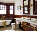 In the primary bathroom’s design was the perfect balance in maintaining the historical charm and using new products. The floor has custom hex mosaic with green details from Restoration Tile, a Cheviot clawfoot tub from Seattle Interiors, and custom brass vanity in a Victorian style from Palmer Industries.