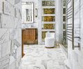 Stunning antique glass fronts disguise drop-down vanity and extra storage. Alto Mirror from RH.
