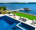 A new dock was completed as icing on the proverbial cake. A spectacular view of Mt. Rainier graces those in the hot tub and pool by All Star Pools, making conversations with those on the adjacent terrace also possible. Aegean Chaises by RH.