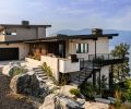 The crow’s nest library offers expansive views of Lake Chelan, with windows and doors throughout sourced from North Cascades Builders Supply. Exterior materials also include cedar and Hardie siding
