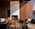 The upstairs deck is perfect for morning coffee or evening cocktails, with owner-provided furnishings and an Astra Fireplace.