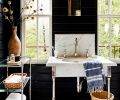 While strolling through Rejuvenation after coffee, Anne spotted the vintage marble sink that adorns the guest bath.The De Wolfs ferried the milled paneling from their property to and from Portland and stained it with General Finishes’ “Lamp Black”.