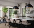 Finishes include brushed oak floors and a porcelain island counter, joined with white leather counter stools from Denver Modern. Bedrosians Cloe tile and Eglo pendant lights bring sheen to the kitchen.