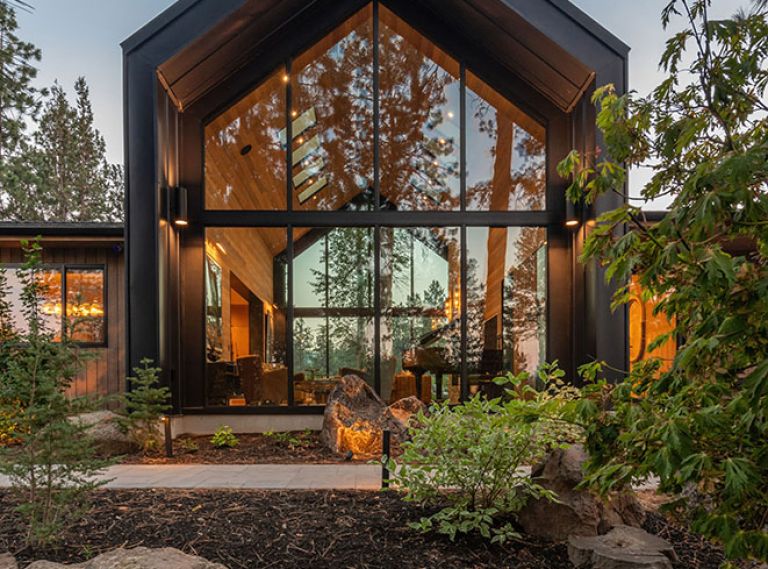 For the front facade, Island Sash & Door installed Weathershield windows and doors. The A-frame section, majestic in stature, is then wrapped in a metal roof and siding, adding weather protection from the harsh Central Oregon climate.