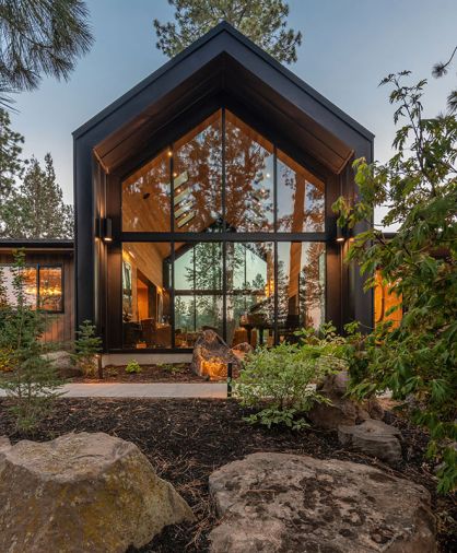 For the front facade, Island Sash & Door installed Weathershield windows and doors. The A-frame section, majestic in stature, is then wrapped in a metal roof and siding, adding weather protection from the harsh Central Oregon climate.