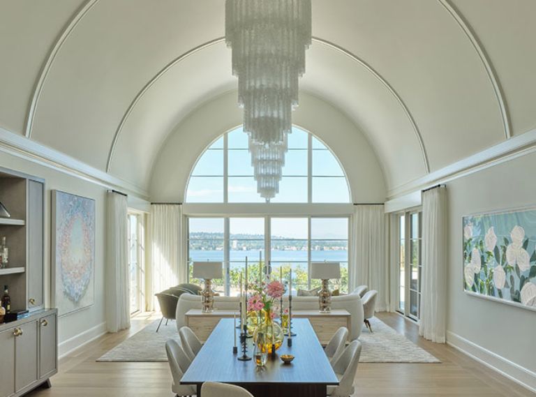 Schultz Miller’s down-to-the-studs restoration of the dramatic barrel-vaulted ceiling’s construction included replacing multiple pieces of rib-like trim with a trio of elegant ones that highlight its curve. Penthouse Drapery’s stationary side panels frame the stunning windows.