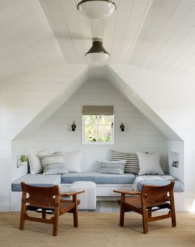 The upstairs built-in dormer with wood cabinet seating is upholstered with “Big Softy” from SDC’s Perennials & Sutherland Showroom. Mid-Century Spanish Armchairs from France & Son add panache set against a golden Dari Cactus rug from Turabi.