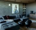 The chill media and music room christened “The Cave” offers a comfy B&B Italia Tuffy Two Modular Sofa from Hive Modern and a Lake Credenza from BDDW.