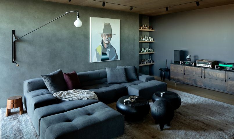 The chill media and music room christened “The Cave” offers a comfy B&B Italia Tuffy Two Modular Sofa from Hive Modern and a Lake Credenza from BDDW.