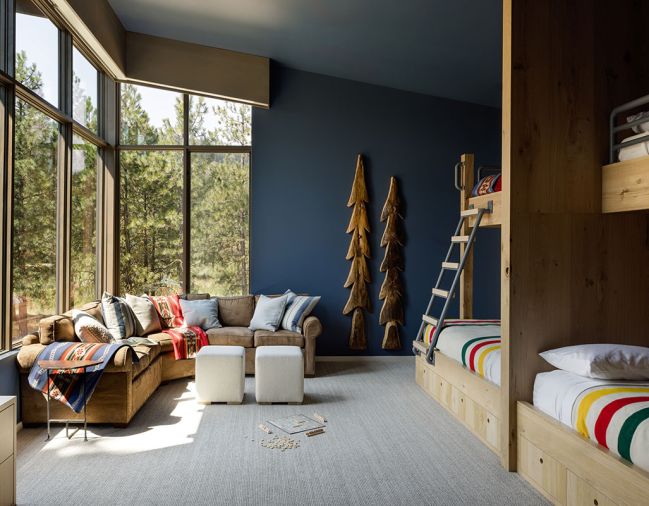 The custom beds in the children’s bunk room are fabricated by Northwest Custom Interiors, and the Chelsea Carpet from DW Select is great for muffling loud play.