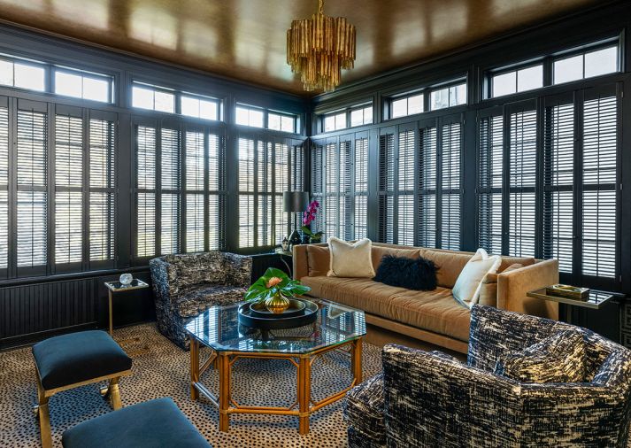 Nifelle Design swathed the den in Benjamin Moore’s “Black.” The sofa was upholstered in camel mohair; a fabric Leonard praises as durable. Kravet custom swivel chairs were added, as well as benches made by Christopher Guy, upholstered in a durable Kravet matte velvet.