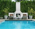 The magnificent pool makeover includes Refine Landscape Architecture&rsquo;s towering chimney design, paired with dual log storage areas set against the company&rsquo;s all new landscaping.