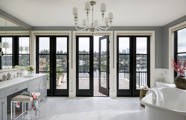 The primary bath is fully-equipped with all the luxuries one could ask for; including a window seat, walk-out deck and a scenic view. The revamped space is perfect for welcoming a new day or a relaxing bath to wind down at the end of a long week.