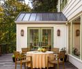 The French glass doors and second floor windows are by Marvin, sourced through Portland Millwork. The house siding was painted Sherwin Williams &ldquo;White Duck.&rdquo;