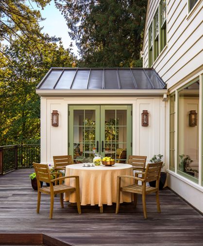 The French glass doors and second floor windows are by Marvin, sourced through Portland Millwork. The house siding was painted Sherwin Williams &ldquo;White Duck.&rdquo;