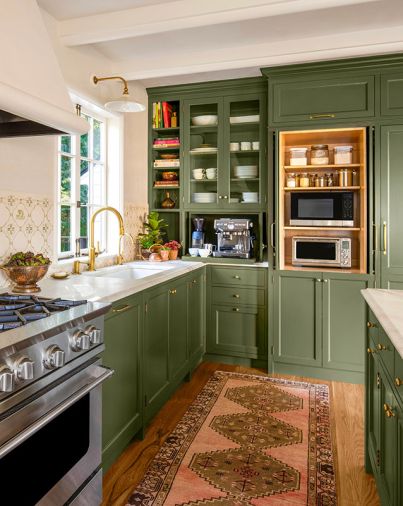In the kitchen, finely crafted custom cabinetry painted in Benjamin Moore&rsquo;s &ldquo;Artichoke&rdquo; sets a rich, grounding tone. A suite of appliances&mdash;including a Liebherr refrigerator, Miele dishwasher, BlueStar range, and Vent-A-Hood integrated within the plaster hood&mdash;was sourced from Eastbank Contractor Appliances, while the Kohler sink was selected through Keller Supply, completing the space with both function and polish.