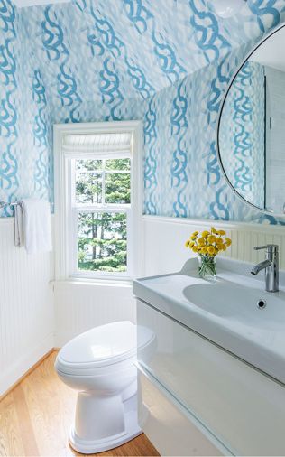 In the guest bathroom the lively wallcovering is from Christopher Farr &ldquo;Fathom in Cobalt&rdquo; from The Dixon Group, Seattle Design Center.