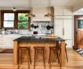 The beauty of an old house often lies in its inherent hominess. Here, walnut, white oak, and fir pair with Calacatta marble counters and custom cabinetry from Bevel.