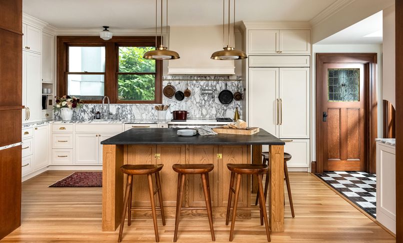 The beauty of an old house often lies in its inherent hominess. Here, walnut, white oak, and fir pair with Calacatta marble counters and custom cabinetry from Bevel.