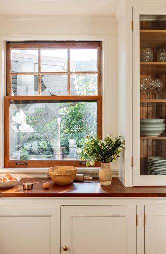 The butler&rsquo;s pantry became the jumping-off point for the rest of the kitchen, with its wood countertops and charming cabinetry influencing the renovation&rsquo;s palette.
