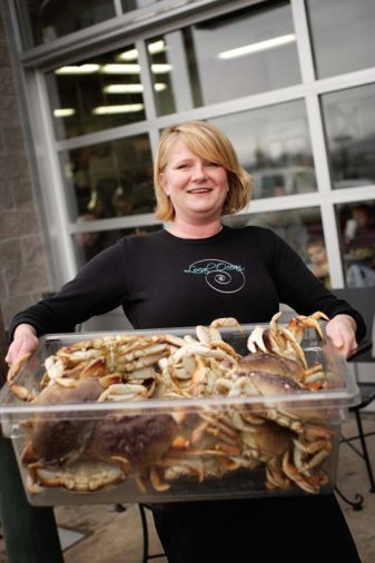 Laura Anderson of Local Ocean showcases the daily catch. Purists will want to order the two pound whole cooked crab in the shell. On blustery days, warm up with the soul-satisfying Roasted Garlic and Dungeness Crab Soup.