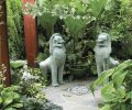 Artist Rick Zook was commissioned to create a black and turquoise pebble mosaic, to play off the patina of the bronze Thai Temple Lions, a find from a local estate sale.