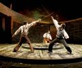 Romeo (Daniel José Molina) and Tybalt (Fajer Al-Kaisi) fight for the honor of their families as Benvolio (Kevin Fugaro) watches over the fallen Mercutio (Jason Rojas) in Romeo and Juliet, part of Oregon Shakespeare Festival’s live theatre lineup.